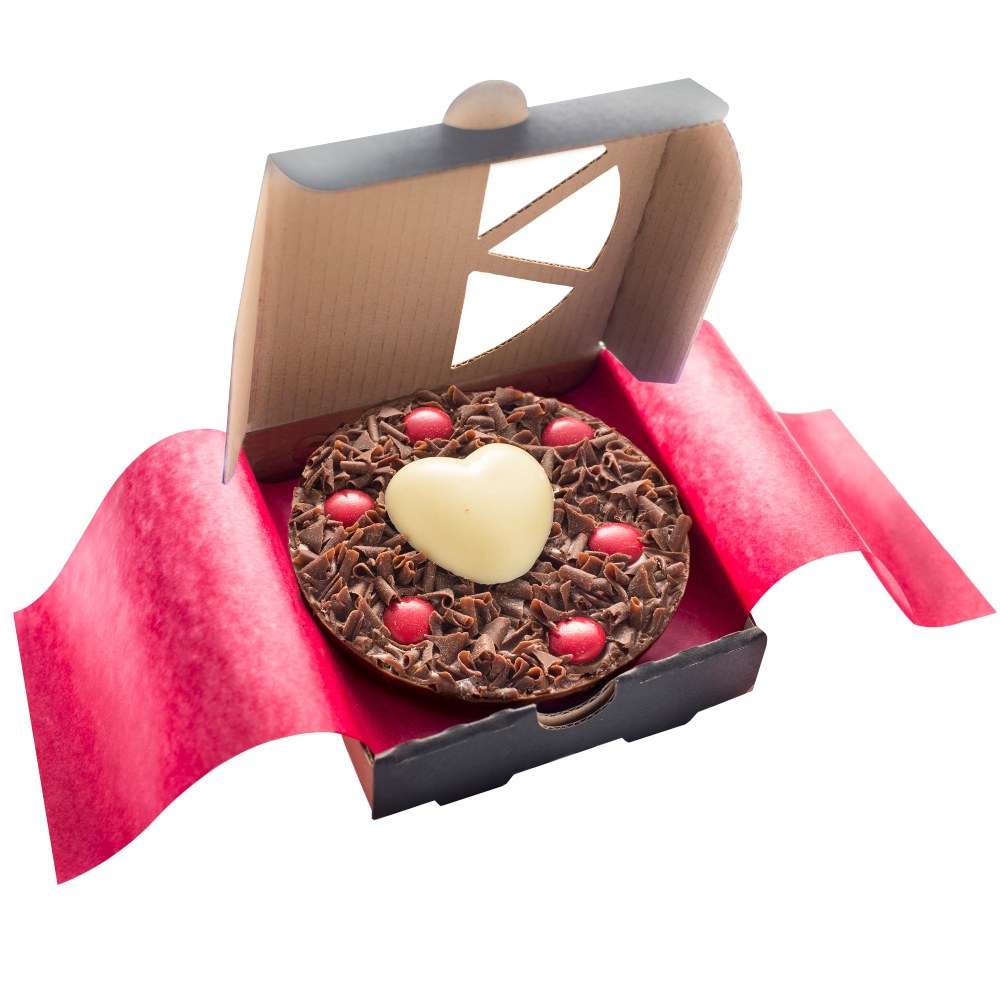Mini 4" Love Chocolate Pizza, with milk chocolate curls and red rainbow drops, finished with a white chocolate heart.